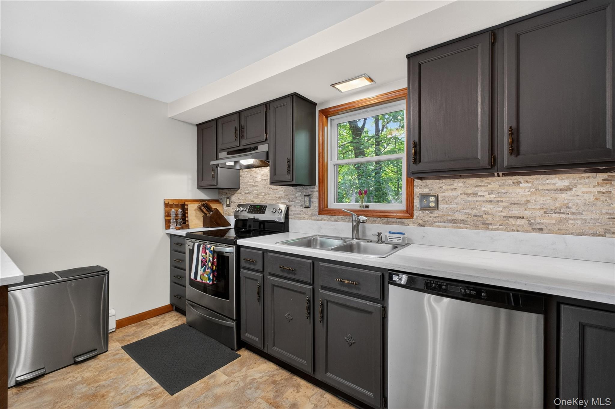 127 Belvedere Road Beacon, NY 12508 - Photo 10 of 37 a kitchen with a sink cabinets and window