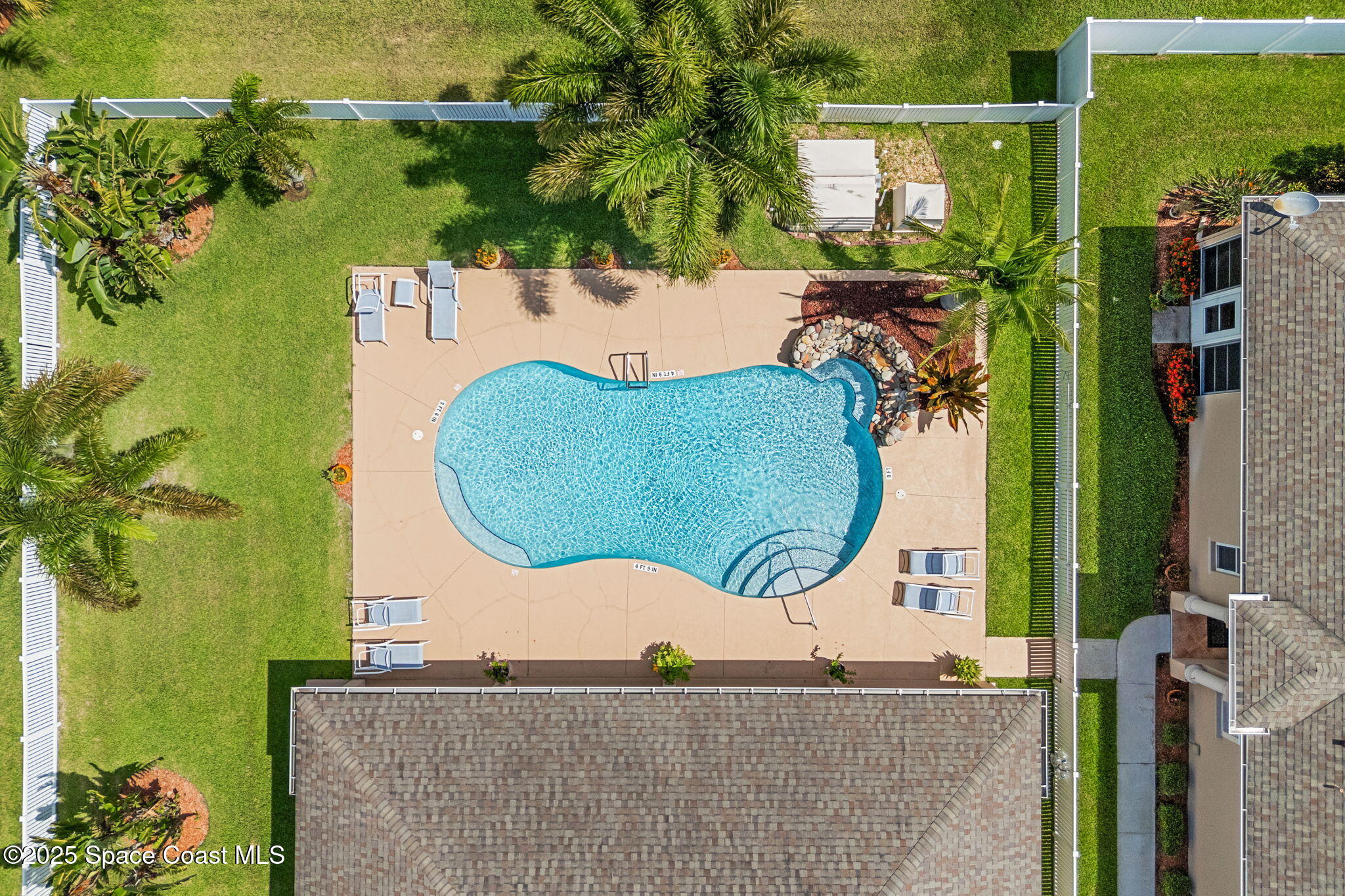 1910 Muirfield Way Southeast, Unit B Palm Bay, FL 32909 - Photo 26 of 34 an aerial view of a house with a swimming pool