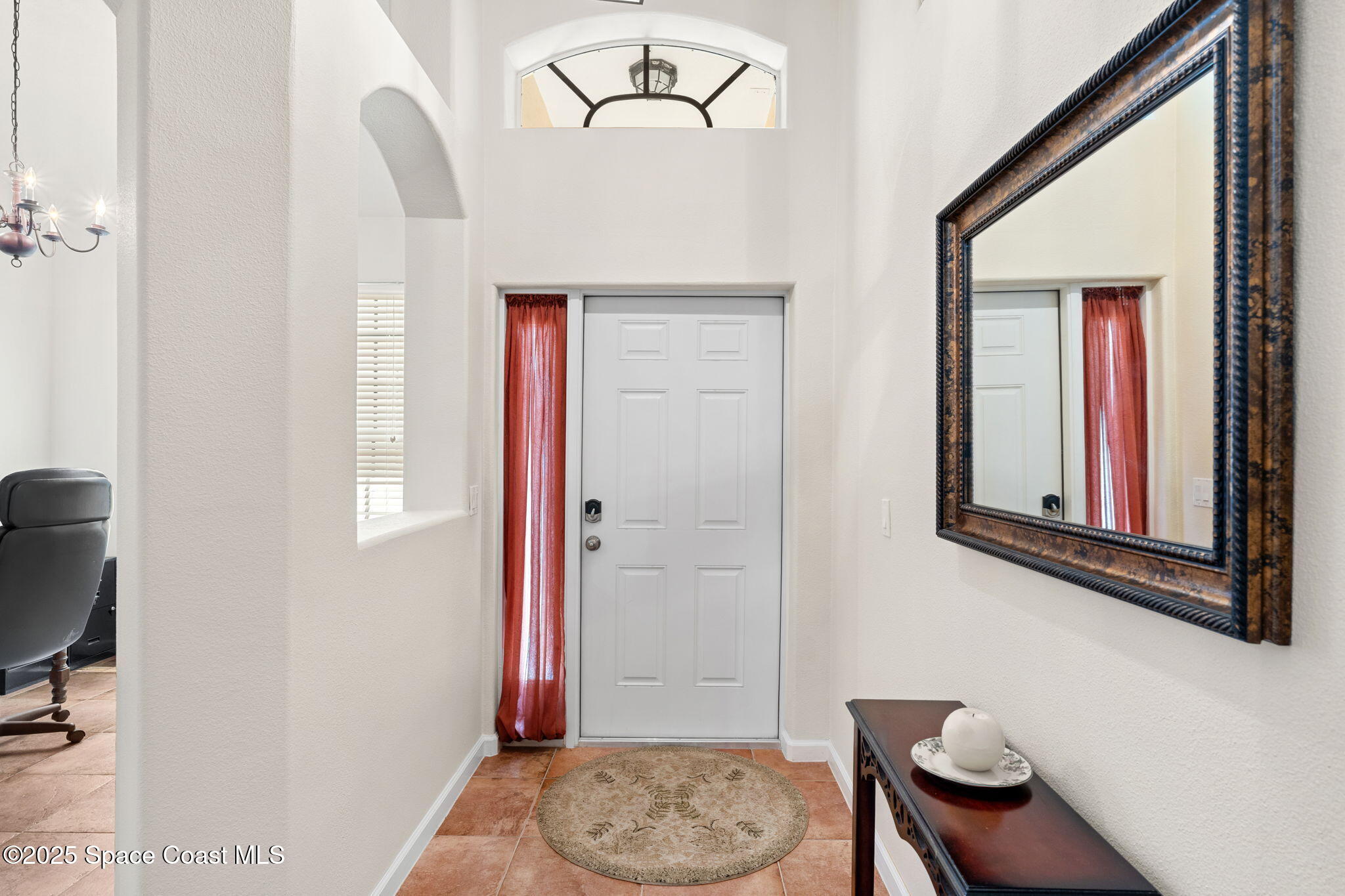 1910 Muirfield Way Southeast, Unit B Palm Bay, FL 32909 - Photo 3 of 34 a living room with furniture and a window