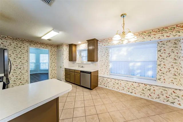 a bathroom with a sink a vanity and a mirror