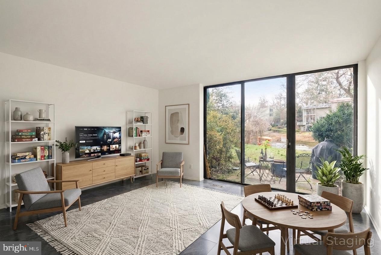 11465 Washington Plaza West Reston, VA 20190 - Photo 36 of 45 Lower level - opens up to backyard and the lake!