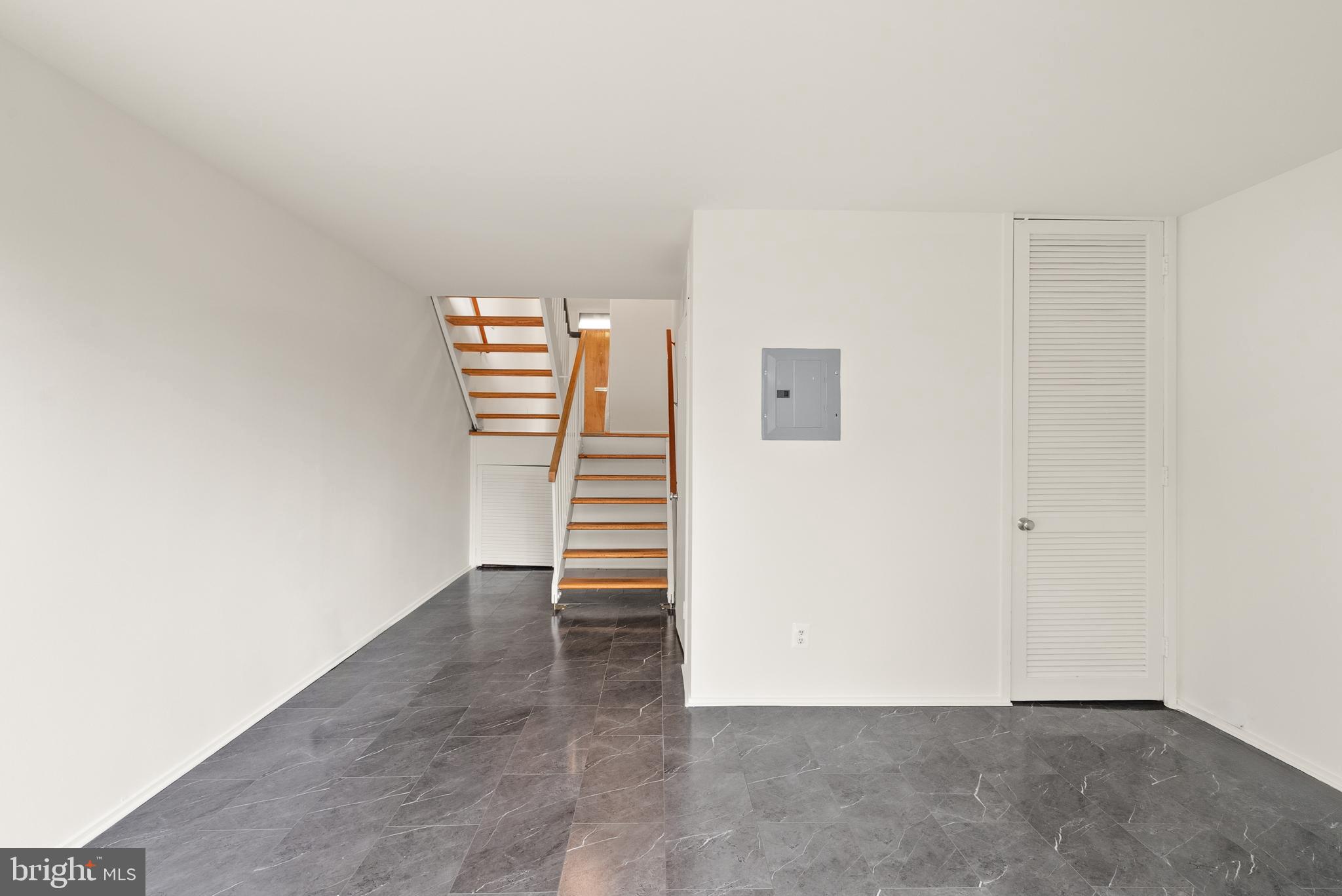 11465 Washington Plaza West Reston, VA 20190 - Photo 38 of 45 Lower level - opens up to backyard and the lake!