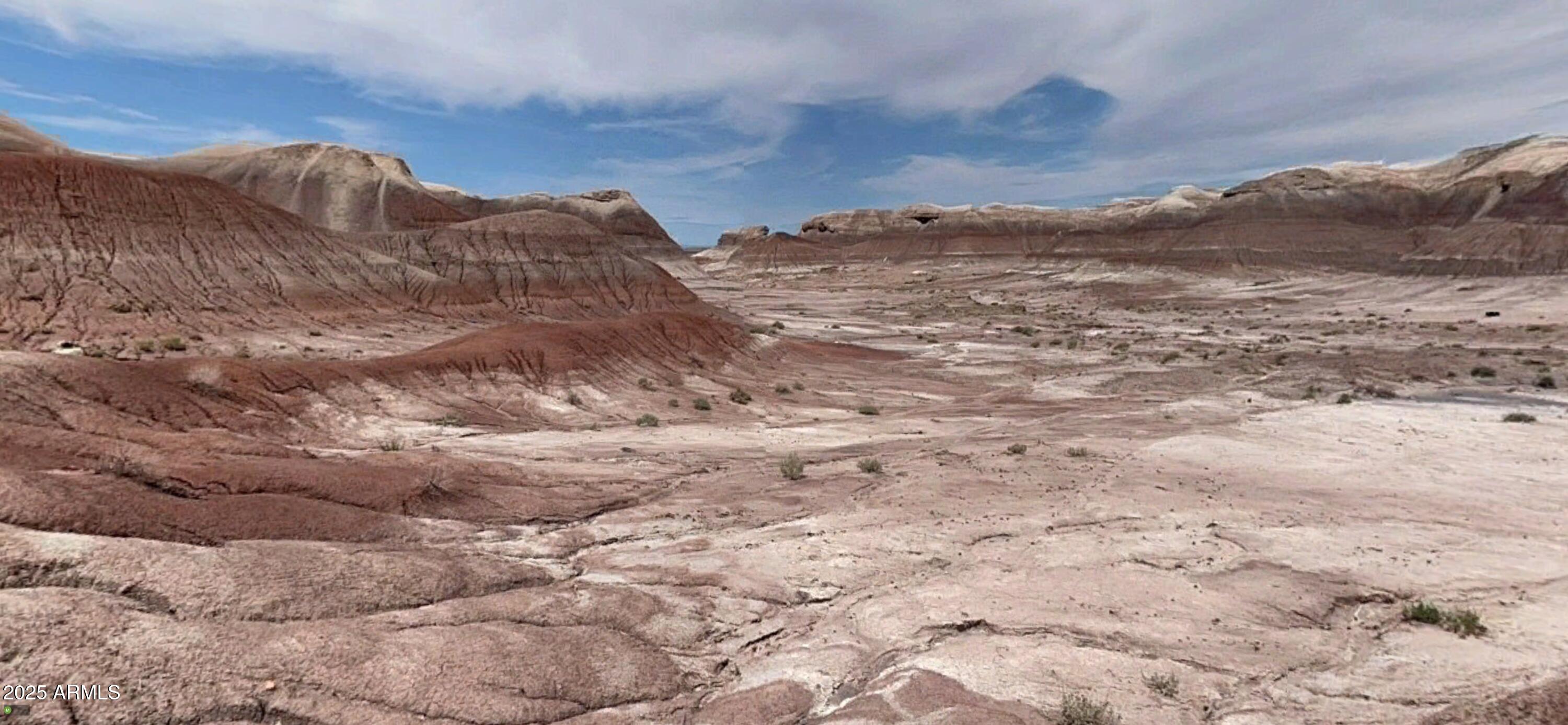 0 Un-named Road Joseph City, AZ 86032 - Photo 6 of 15 a view of a dry field with mountains in the background