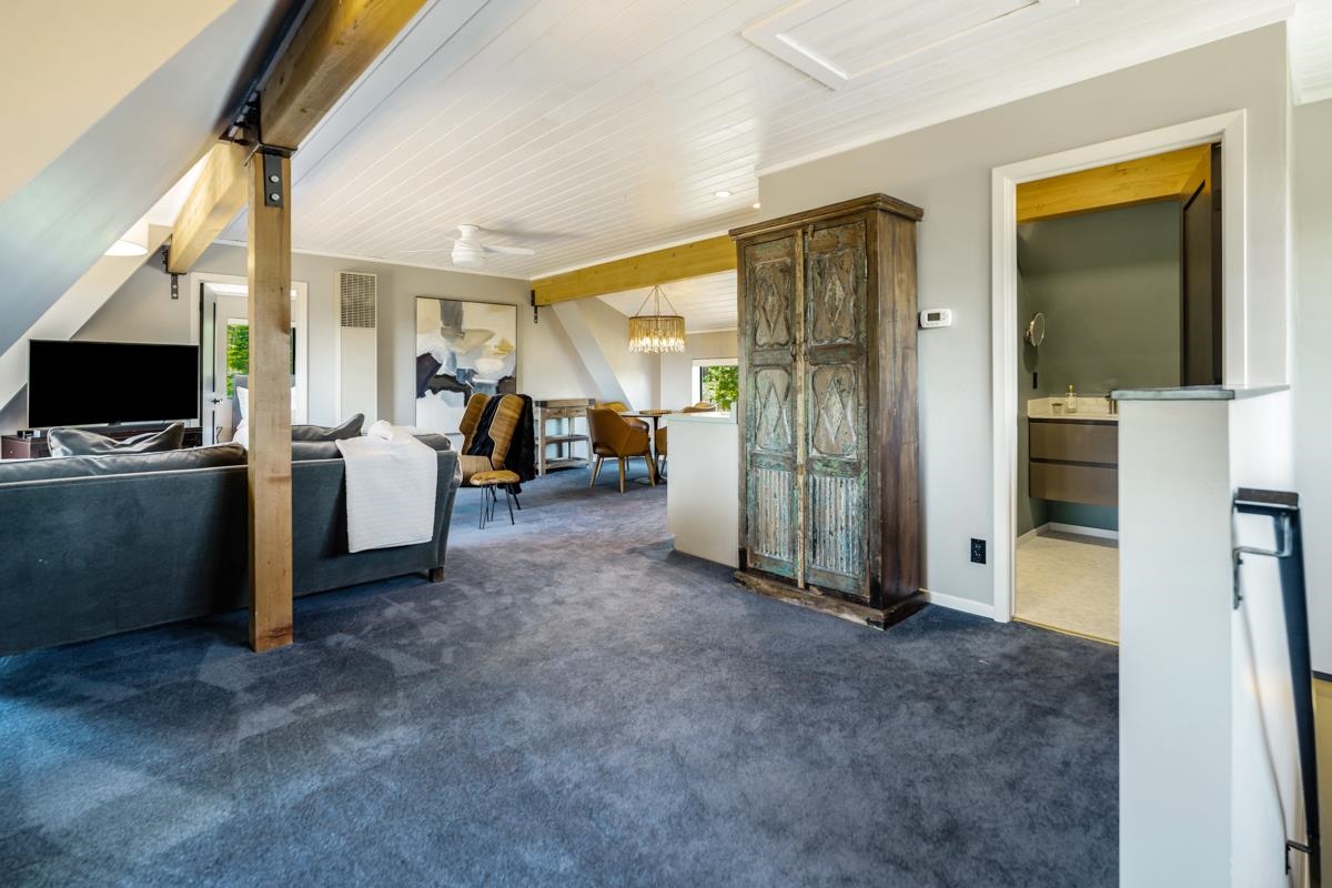 10734 Chickwick Reach Truckee, CA 96161 - Photo 13 of 21 a view of a livingroom with furniture and a flat screen tv