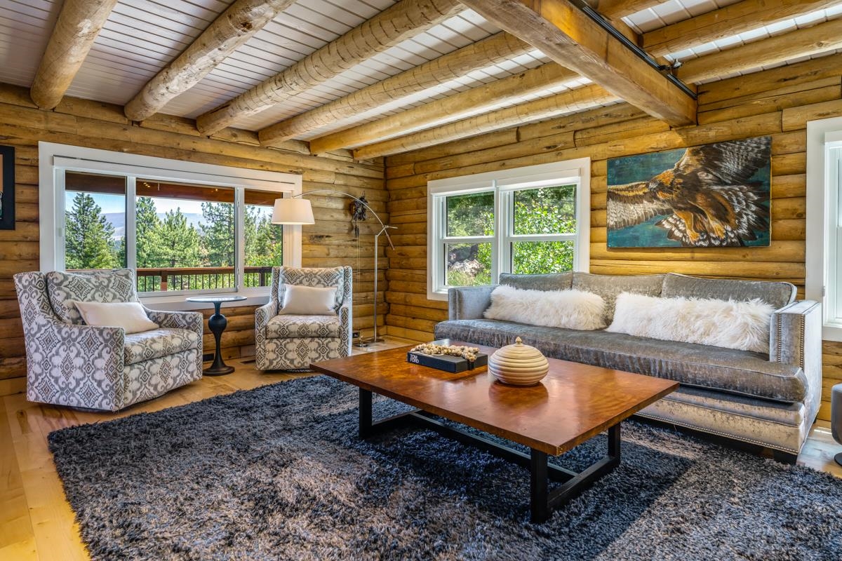 10734 Chickwick Reach Truckee, CA 96161 - Photo 2 of 21 a living room with furniture and a large window