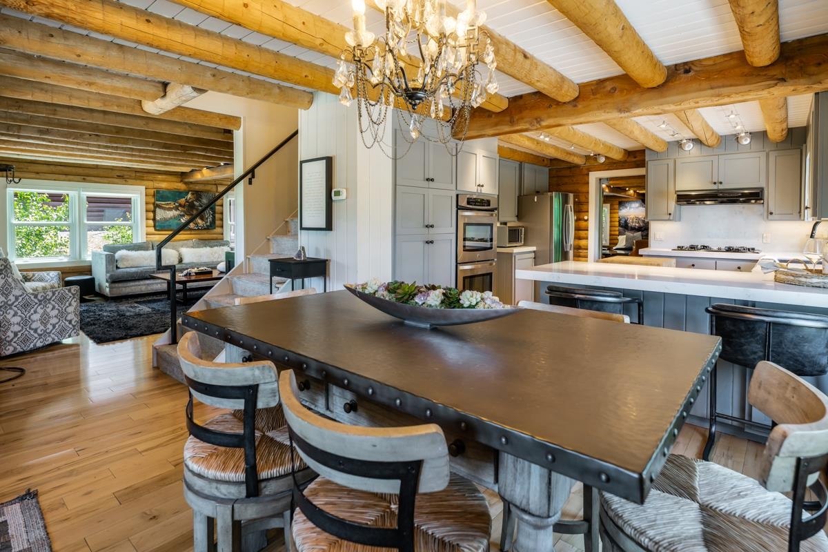 10734 Chickwick Reach Truckee, CA 96161 - Photo 5 of 21 a view of a dining room with furniture window and wooden floor