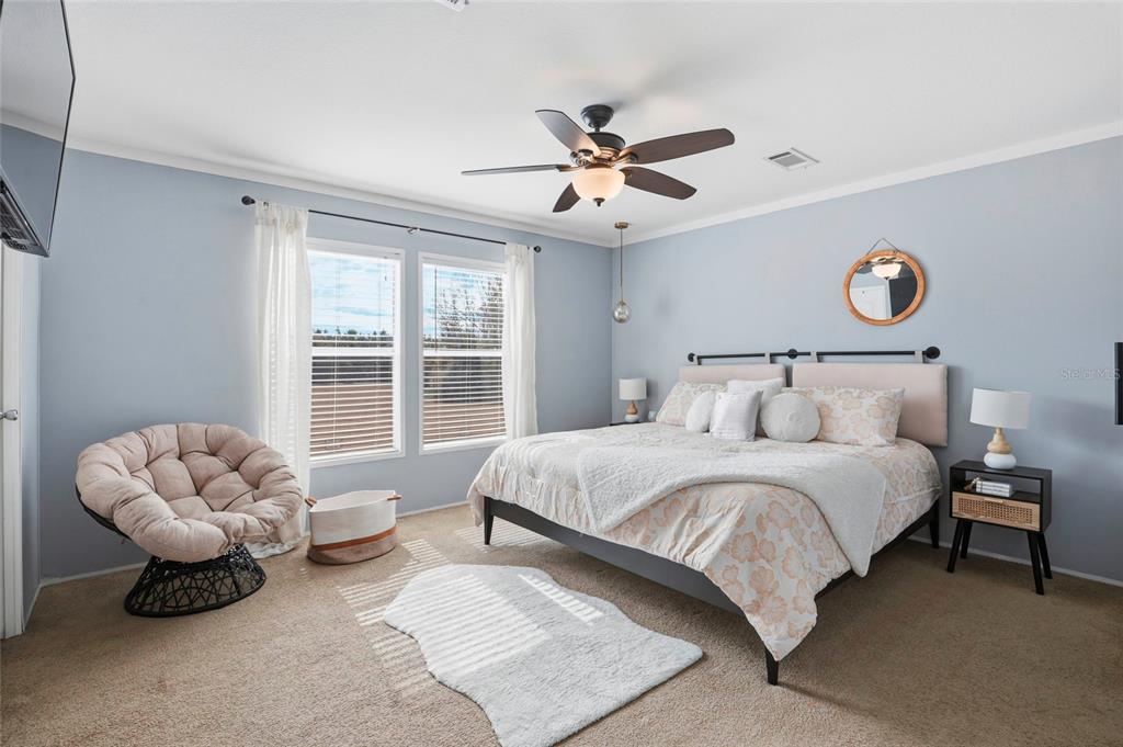 952 Gallilee Loop Lake City, FL 32024 - Photo 31 of 60 a bedroom with bed and a large window