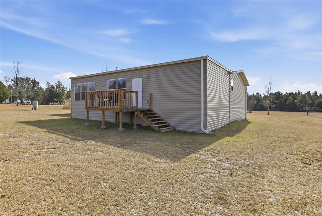 952 Gallilee Loop Lake City, FL 32024 - Photo 44 of 60 a house view with a backyard space
