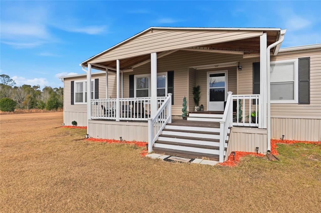 952 Gallilee Loop Lake City, FL 32024 - Photo 60 of 60 front view of a house with a small yard