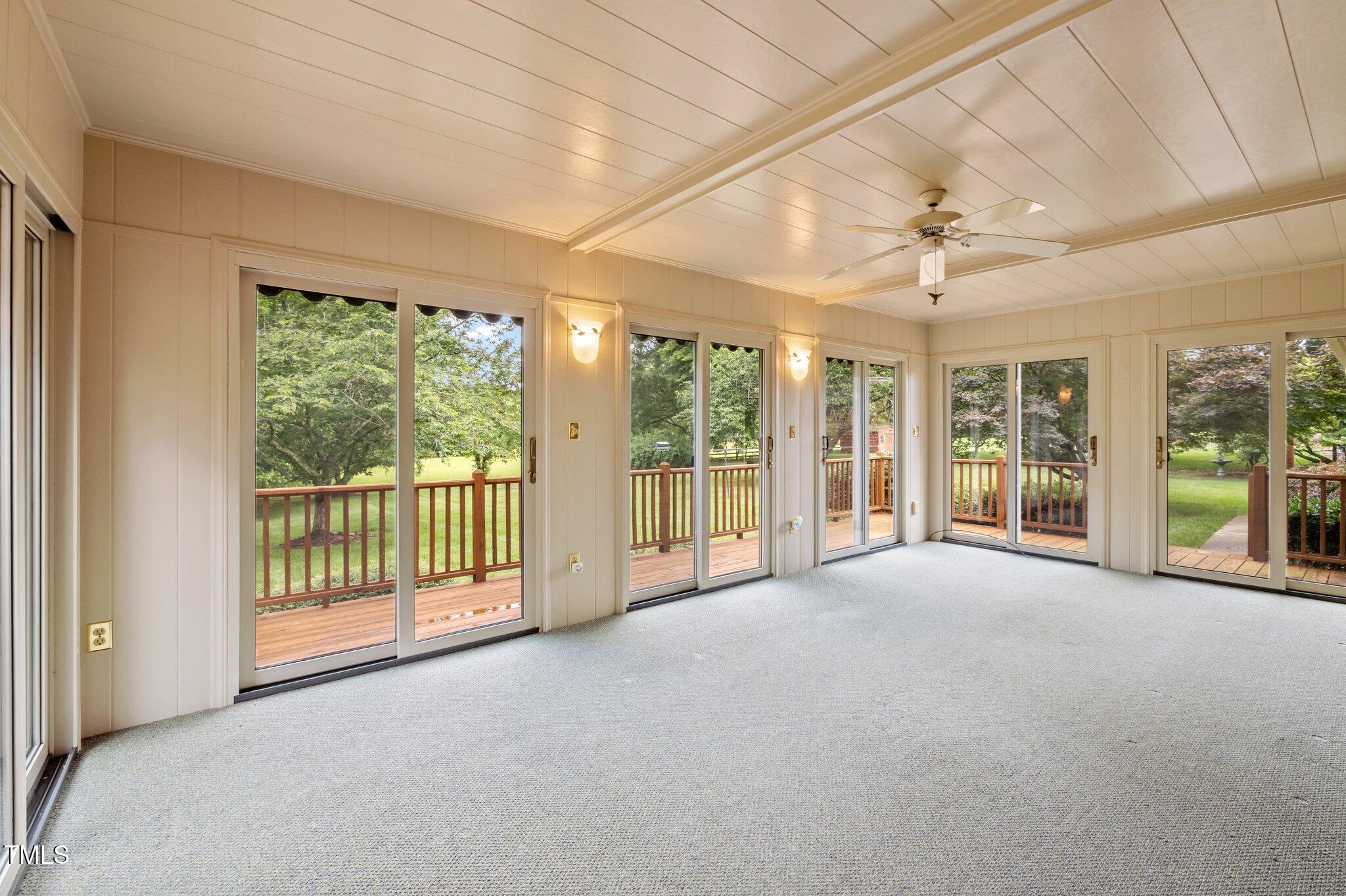 913 Milton Road Durham, NC 27712 - Photo 14 of 29 a view of an empty room with windows