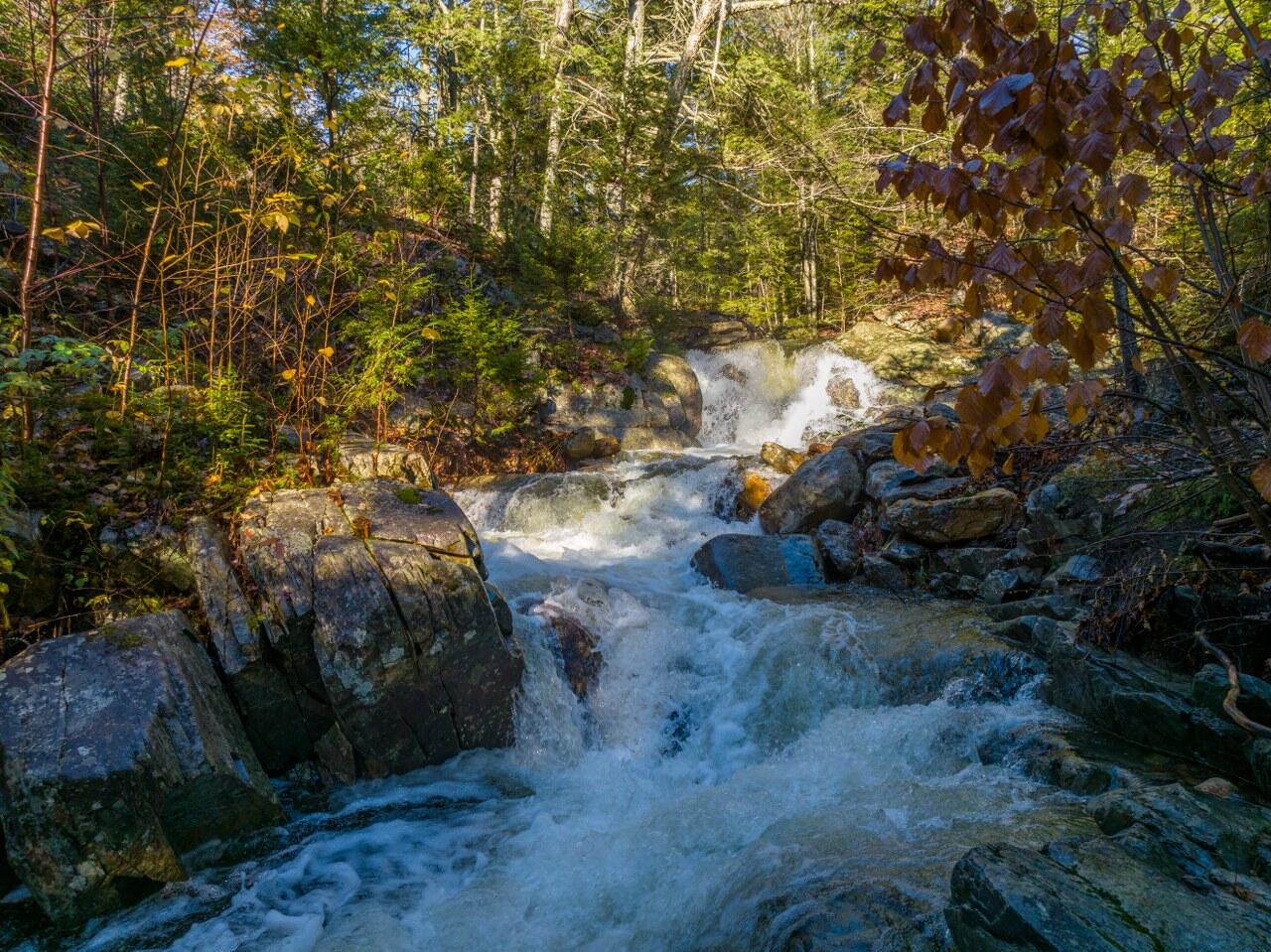 440 Belfast Road, Unit INIO E1 Camden, ME 04843 - Photo 11 of 15 Waterfall - one of seven