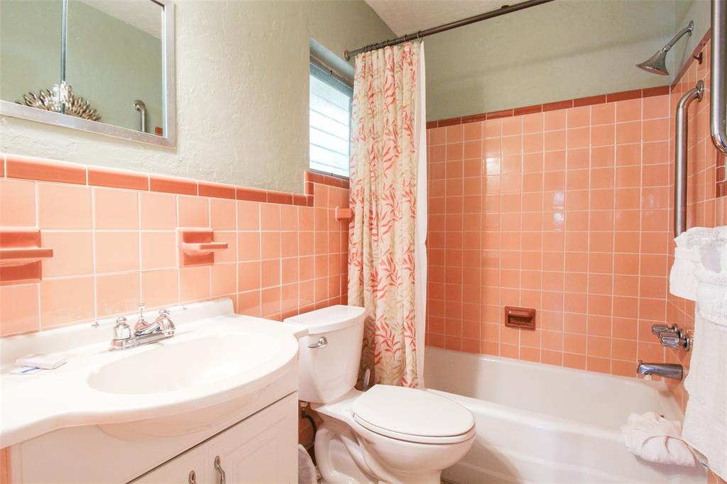 Undisclosed Address Venice, FL 34285 - Photo 19 of 63 a bathroom with a sink a toilet and shower