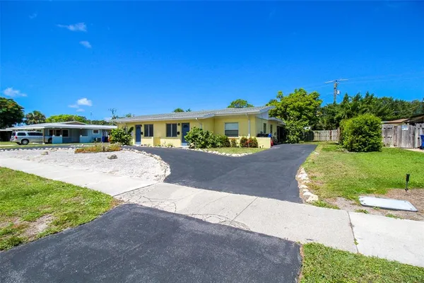 a view of a swimming pool with a patio