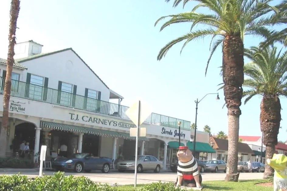 Undisclosed Address Venice, FL 34285 - Photo 26 of 63 a view of a building with a garden and plants