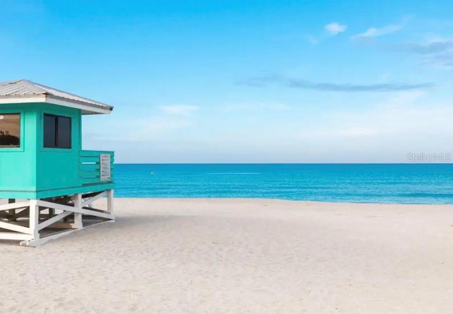 Undisclosed Address Venice, FL 34285 - Photo 30 of 63 a room with a mirror and a table