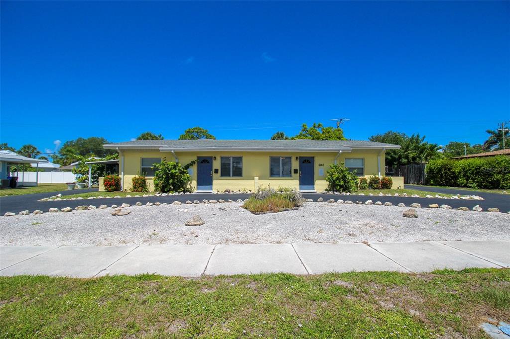 Undisclosed Address Venice, FL 34285 - Photo 33 of 63 a front view of a house with a yard