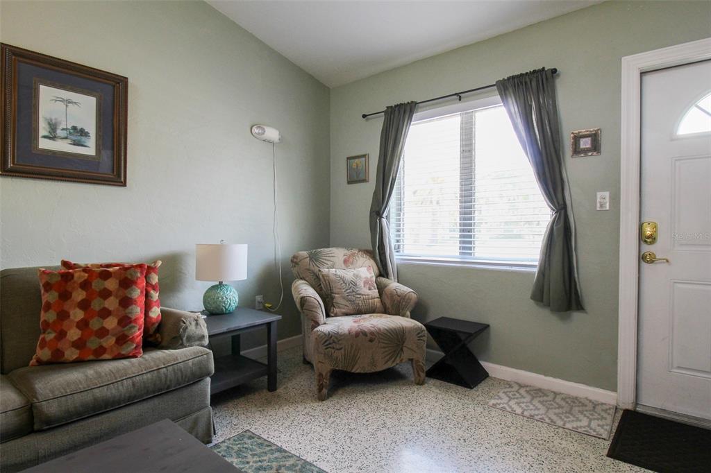 Undisclosed Address Venice, FL 34285 - Photo 39 of 63 a living room with furniture and a window