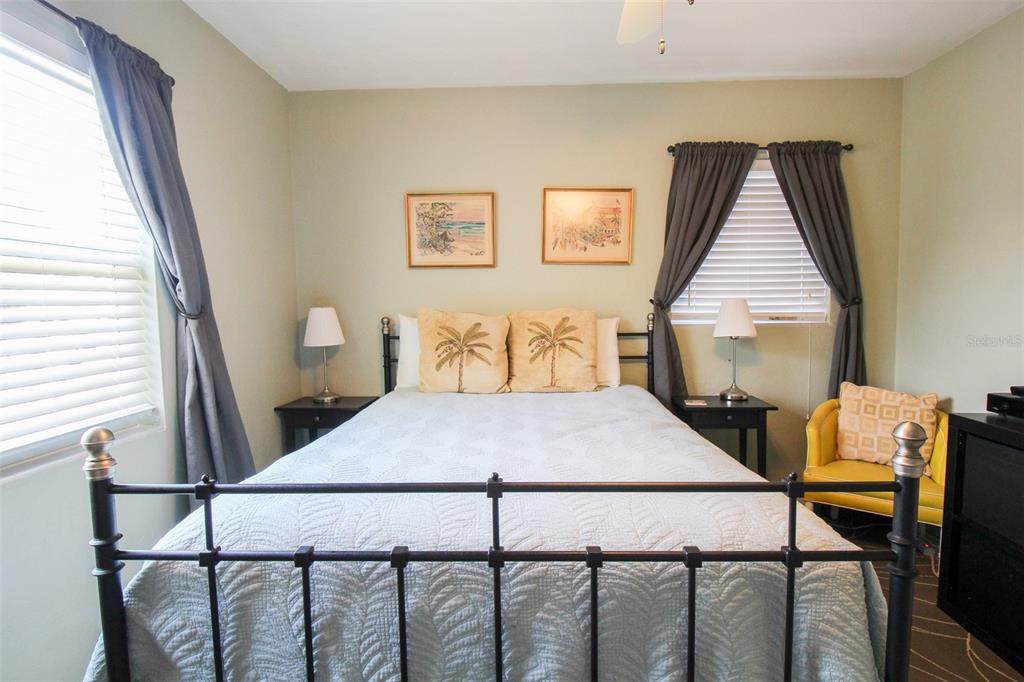 Undisclosed Address Venice, FL 34285 - Photo 44 of 63 a bedroom with a bed and a window