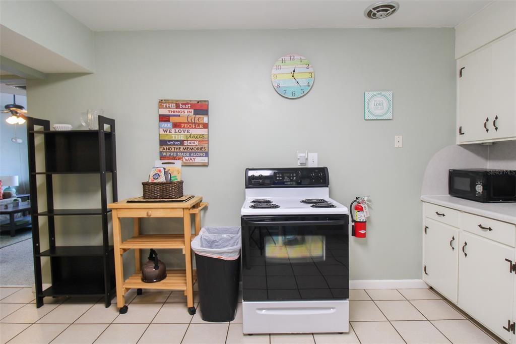 Undisclosed Address Venice, FL 34285 - Photo 48 of 63 a kitchen with a stove top oven and refrigerator