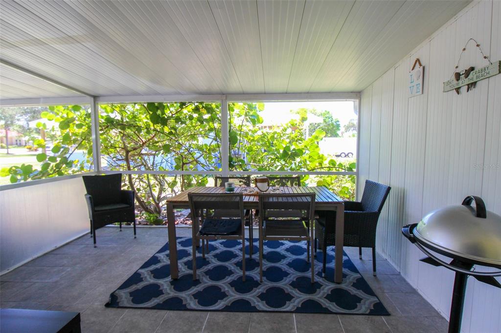 Undisclosed Address Venice, FL 34285 - Photo 55 of 63 a view of a dining room with furniture window and outside view