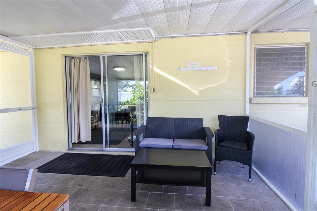 Undisclosed Address Venice, FL 34285 - Photo 56 of 63 a living room with furniture and a window