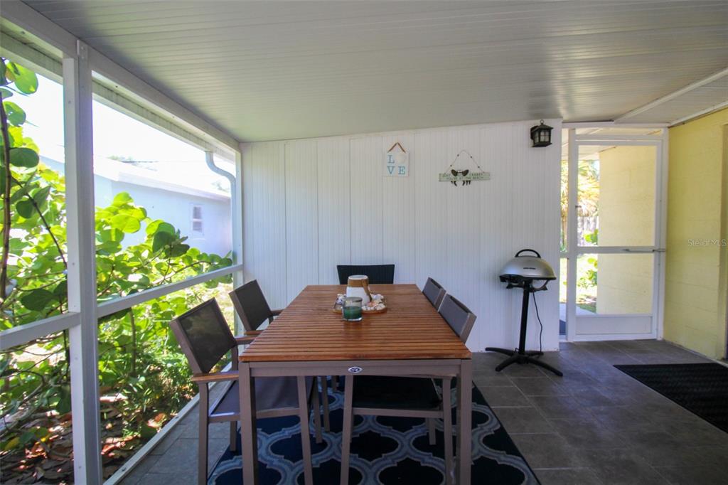 Undisclosed Address Venice, FL 34285 - Photo 57 of 63 a view of a dining room with furniture window and outside view