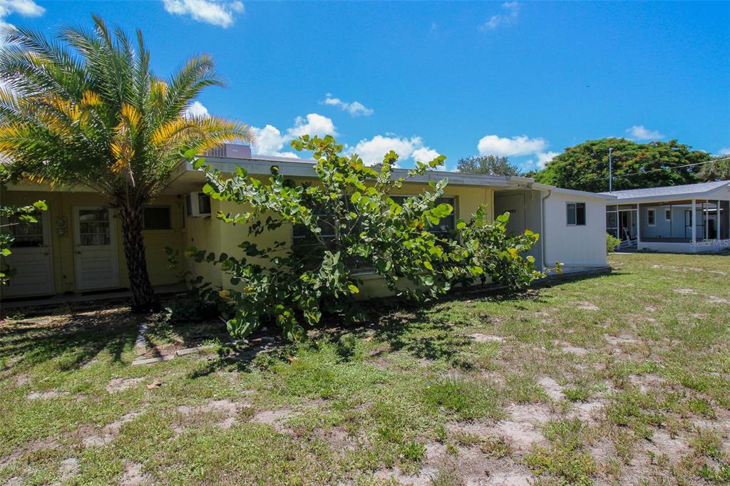 Undisclosed Address Venice, FL 34285 - Photo 61 of 63 a front view of a house with a yard