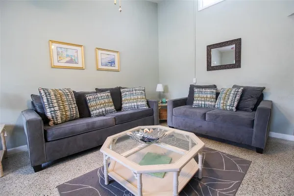 a living room with furniture and a couch