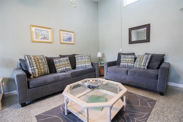 a living room with furniture and a couch