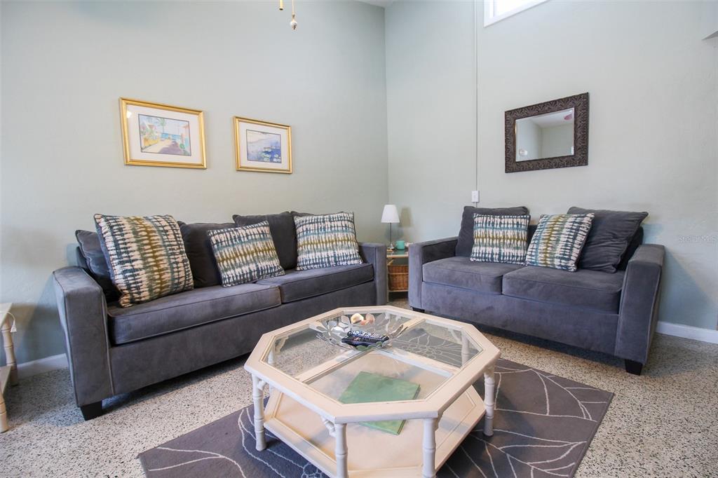 Undisclosed Address Venice, FL 34285 - Photo 7 of 63 a living room with furniture and a couch