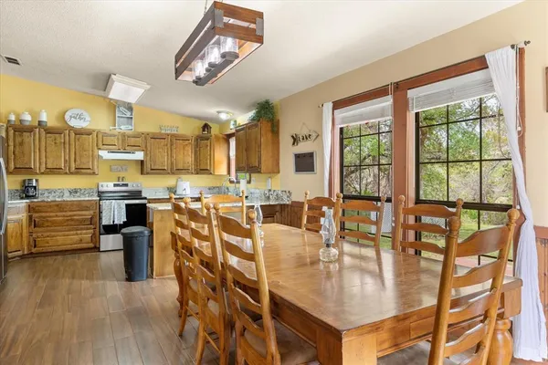a very nice looking kitchen with a large window