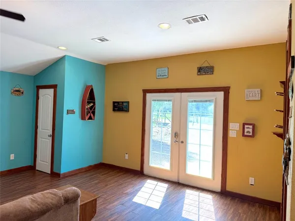 a view of livingroom with furniture and wooden floor