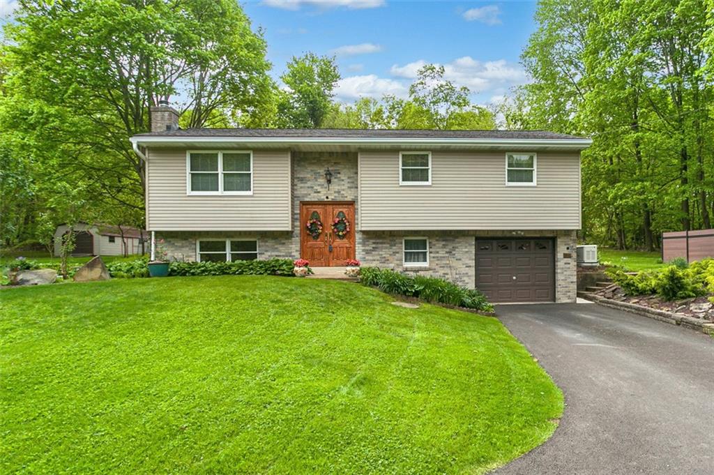 350 Apache Lane Apollo, PA 15613 - Photo 1 of 34 a view of a house with a yard and sitting area