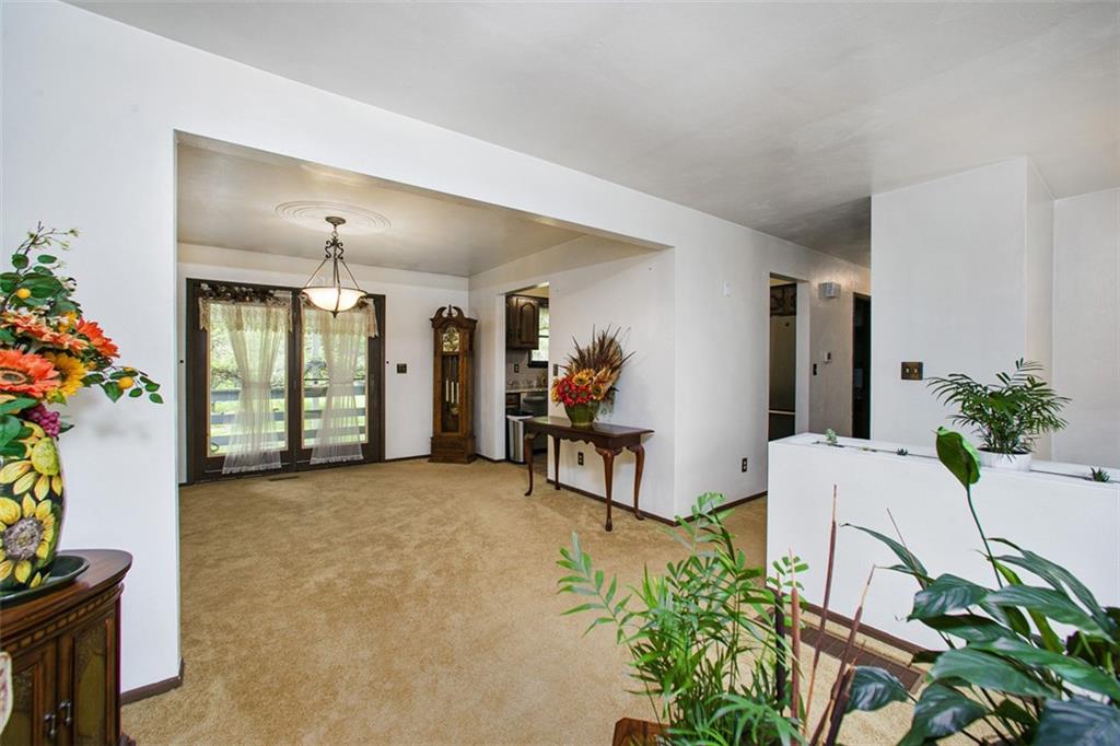 350 Apache Lane Apollo, PA 15613 - Photo 15 of 34 a living room with furniture and a potted plant