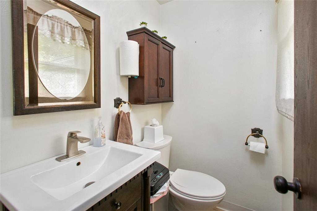 350 Apache Lane Apollo, PA 15613 - Photo 27 of 34 a bathroom with a sink vanity mirror and toilet