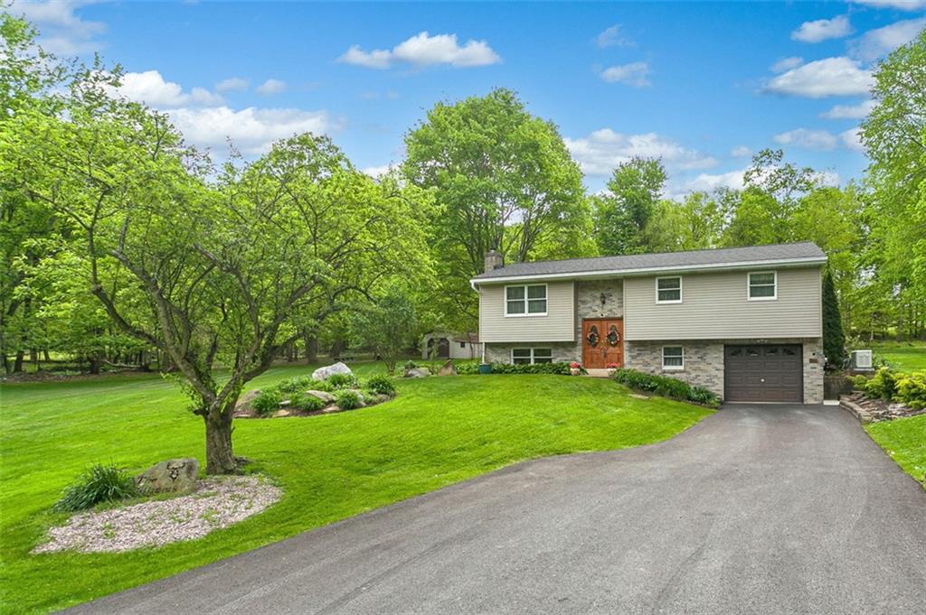 350 Apache Lane Apollo, PA 15613 - Photo 3 of 34 a front view of a house with garden