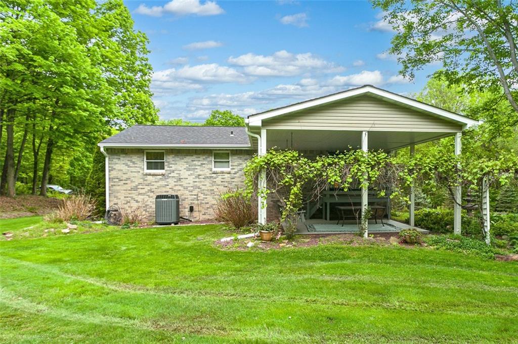 350 Apache Lane Apollo, PA 15613 - Photo 8 of 34 a view of a house with backyard and a garden