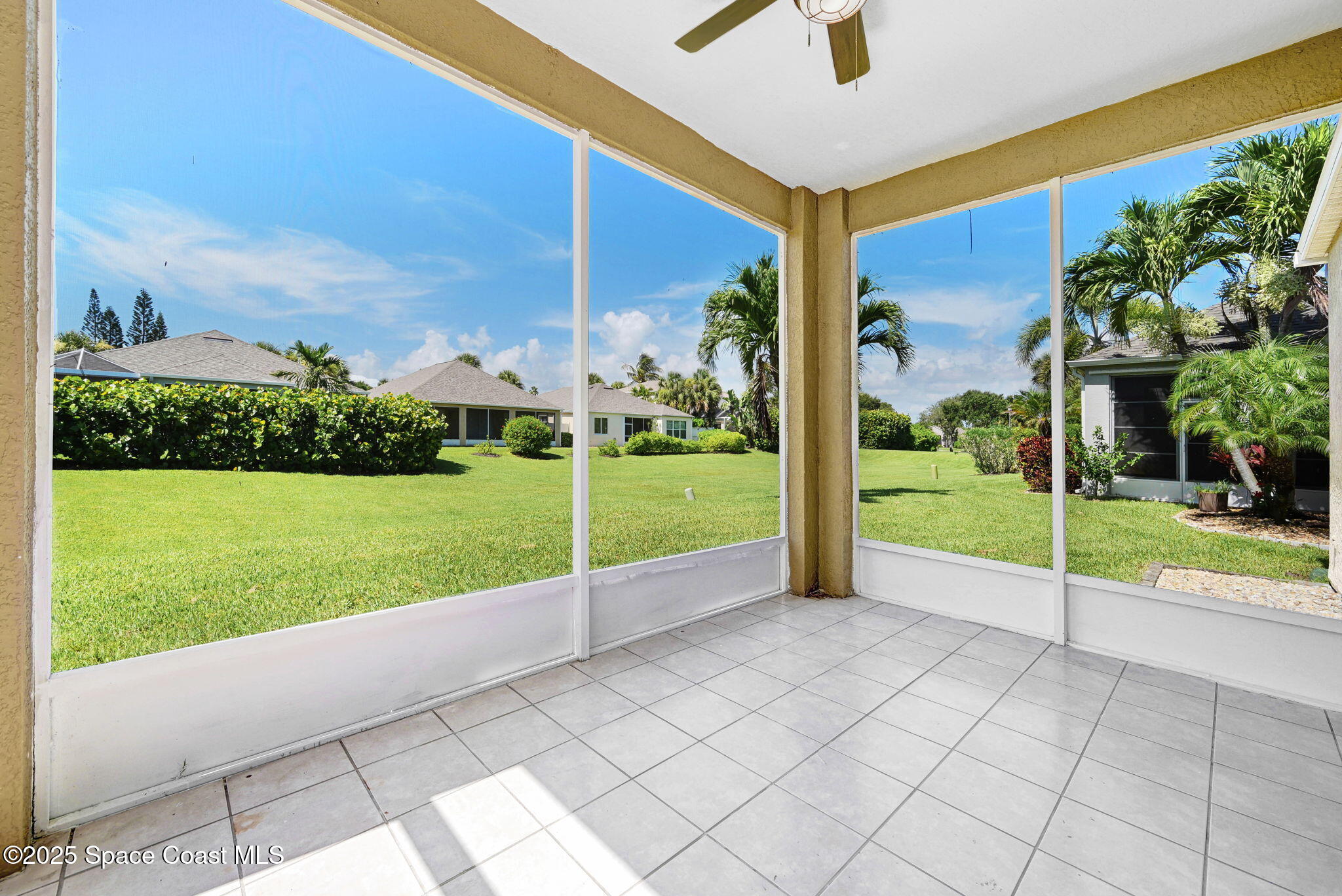 165 Calico Lane Indialantic, FL 32903 - Photo 18 of 25 a view of a garden with an empty room
