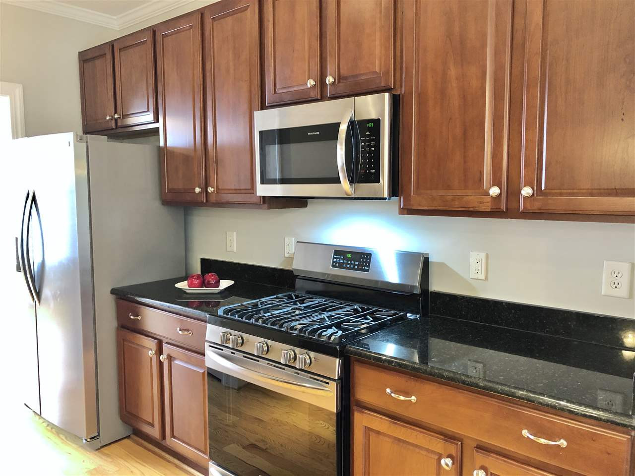 6107 Shandwick Court Raleigh, NC 27609 - Photo 5 of 21 New Refrigerator, Gas Range and Microwave Oven Kitchen