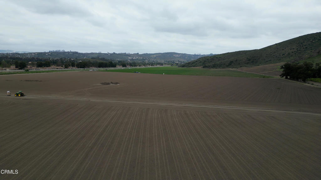 62 Calleguas Camarillo, CA 93012 - Photo 3 of 13 a view of a lake with houses in background
