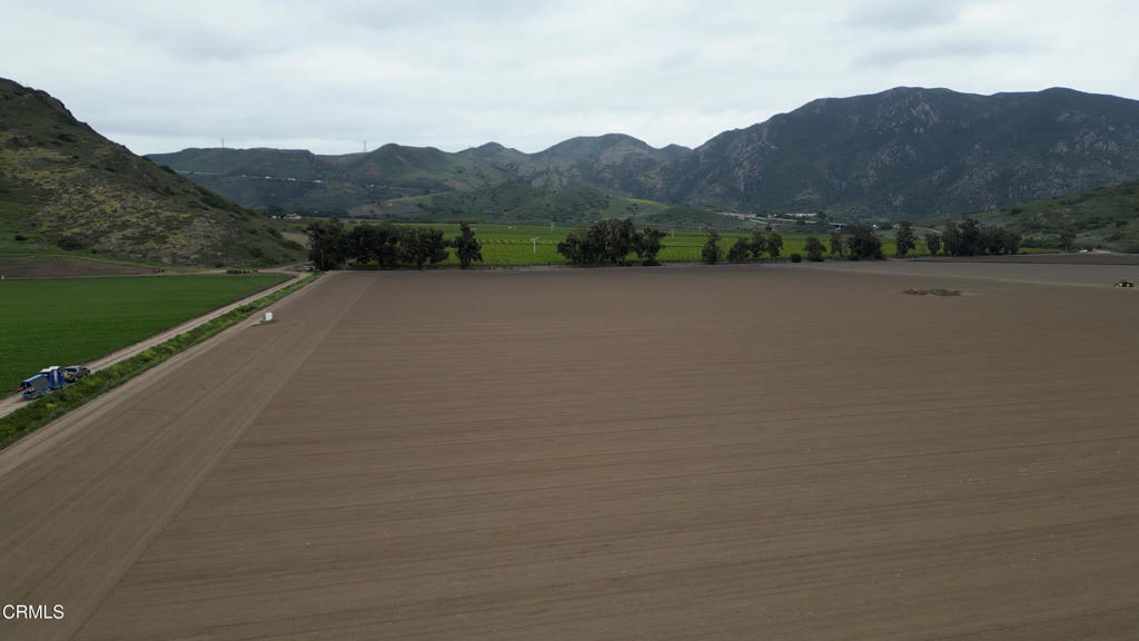 62 Calleguas Camarillo, CA 93012 - Photo 5 of 13 a view of a lake with mountains in the background