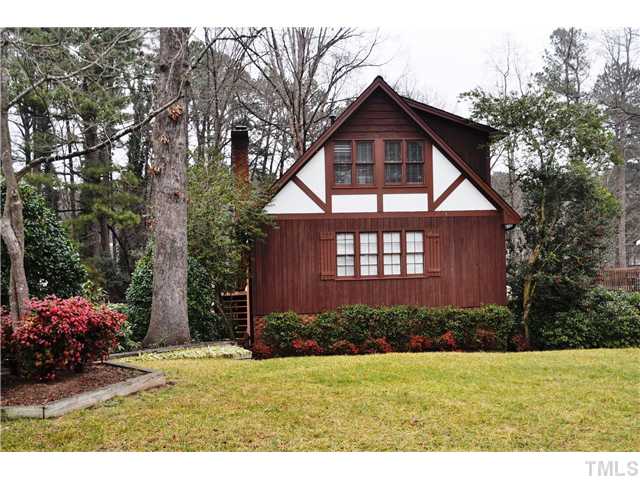 7528 Fiesta Way Raleigh, NC 27615 - Photo 22 of 22 a front view of a house with garden