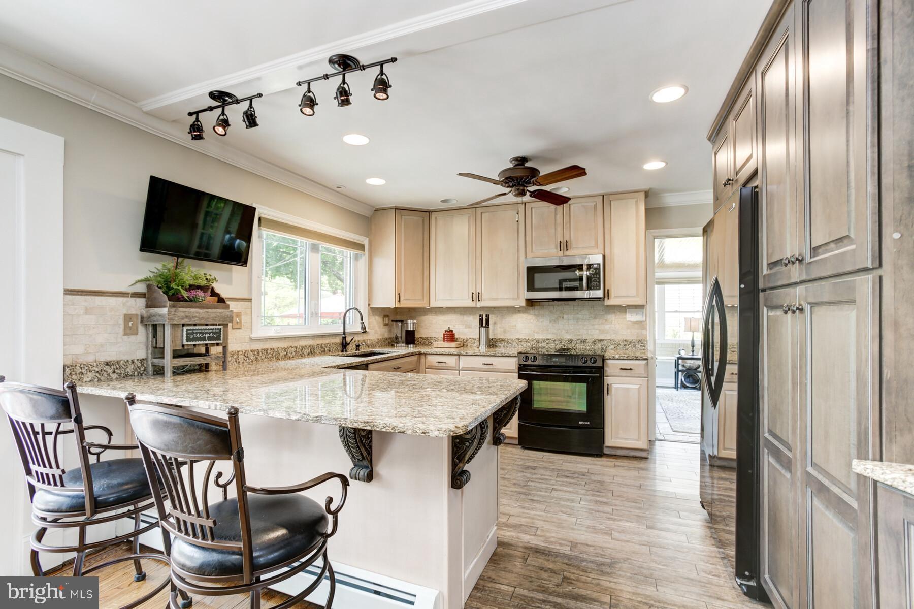 3650 Valley Road Ellicott City, MD 21042 - Photo 7 of 36 Spacious Kitchen with Breakfast Bar