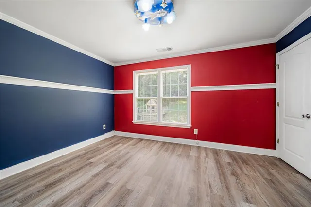 an empty room with window