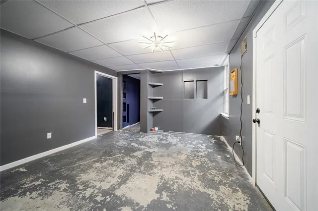 a view of a hallway with a chandelier