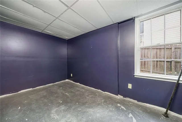 an empty room with windows