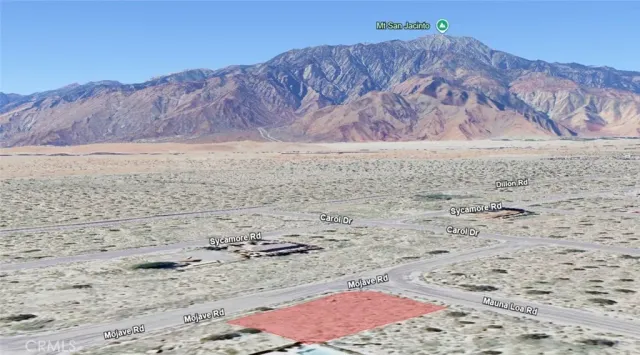 a view of wooden floor in front of a house