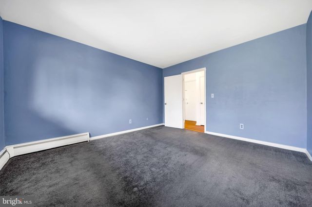 an empty room with an empty space and a window