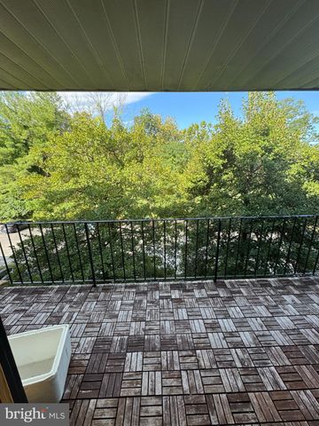 a front view of house and yard with green space