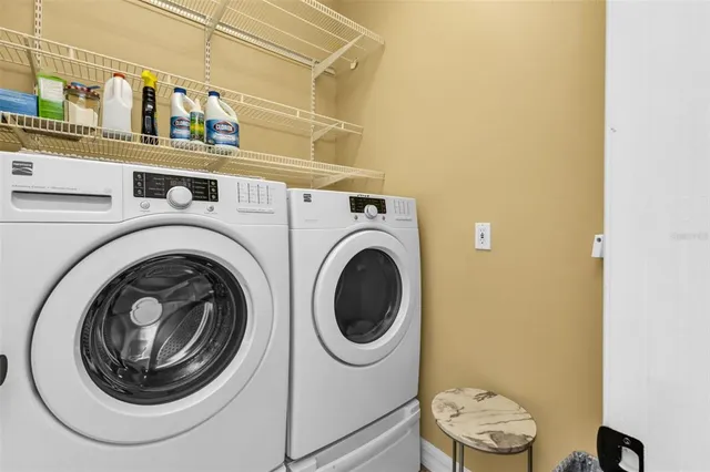 a view of an outdoor sitting area with swimming pool